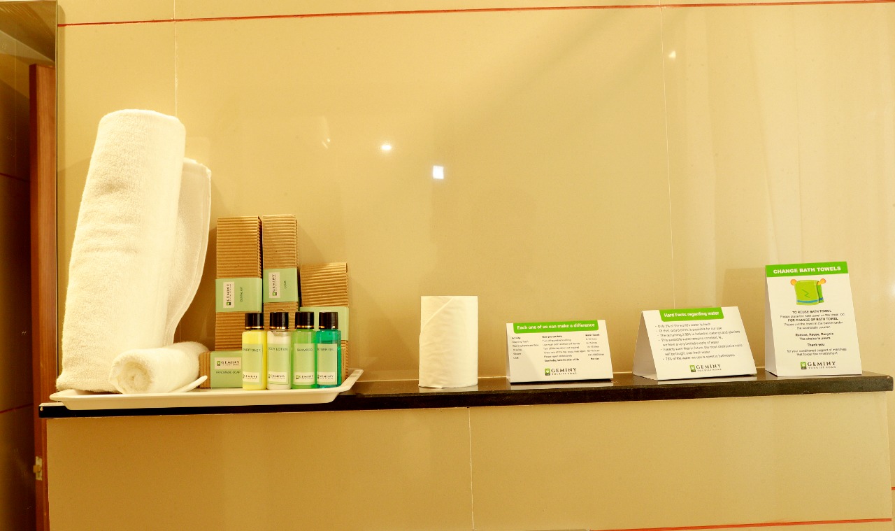 Branded toiletries and personal care kits provided in rooms